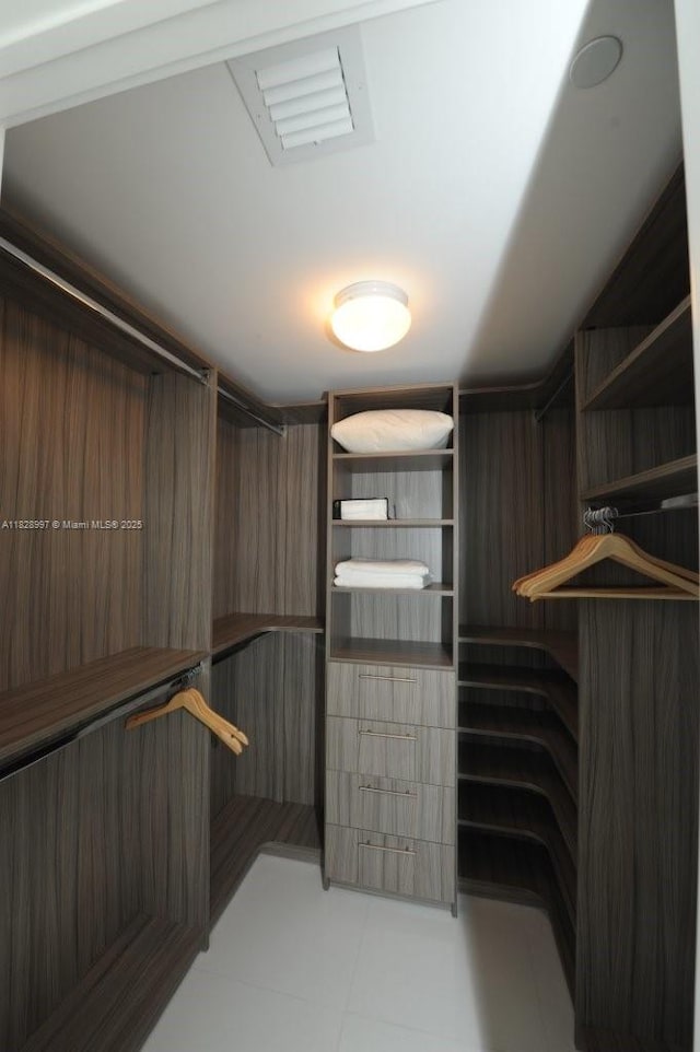 50 Biscayne Blvd Unit 4706, Miami, FL 33132 - walk in closet featuring light tile patterned flooring