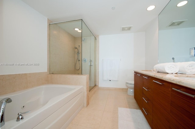 50 Biscayne Blvd Unit 4706, Miami, FL 33132 - full bathroom with vanity, a jetted tub, a stall shower, tile patterned flooring, and recessed lighting
