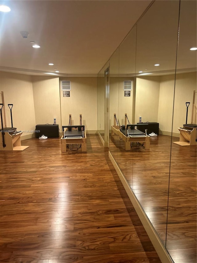 50 Biscayne Blvd Unit 4706, Miami, FL 33132 - exercise area with dark wood-style flooring, ornamental molding, and recessed lighting