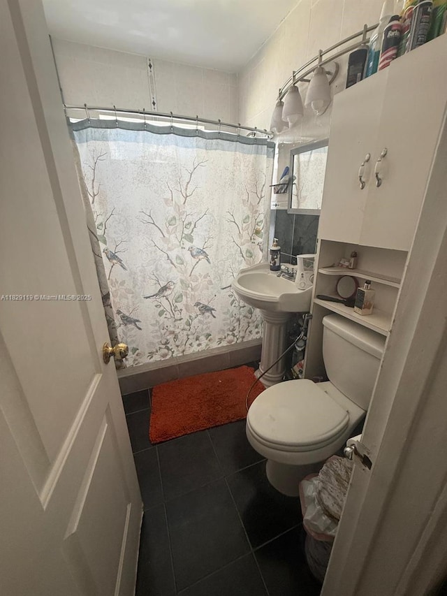 7900 SW 21st Ter, Miami, FL 33155 - bathroom featuring toilet and tile patterned flooring