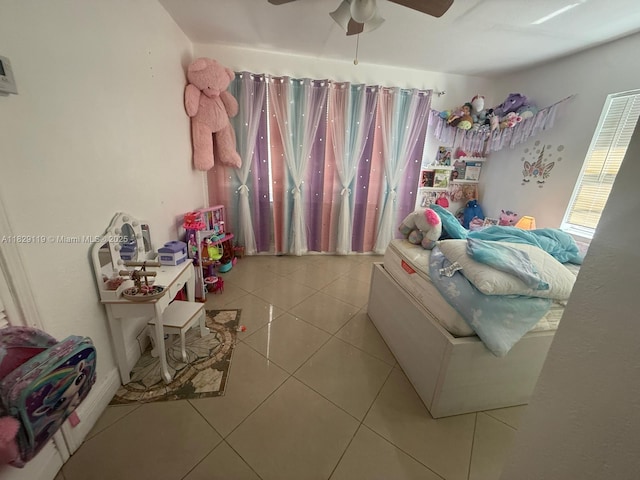 7900 SW 21st Ter, Miami, FL 33155 - bedroom featuring light tile patterned floors and ceiling fan
