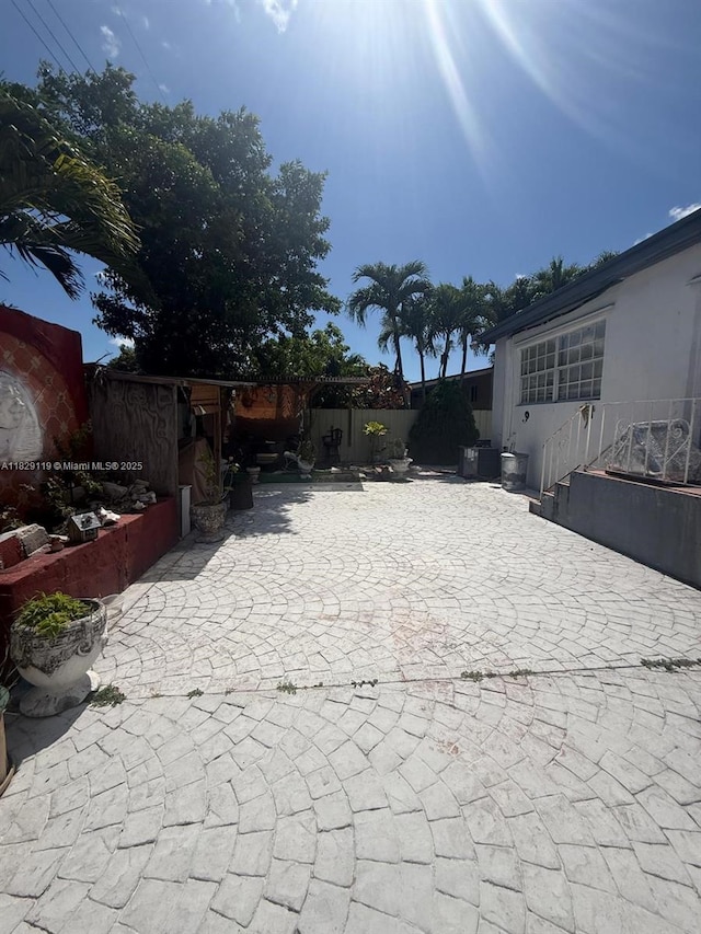 7900 SW 21st Ter, Miami, FL 33155 - view of yard with a patio and decorative driveway