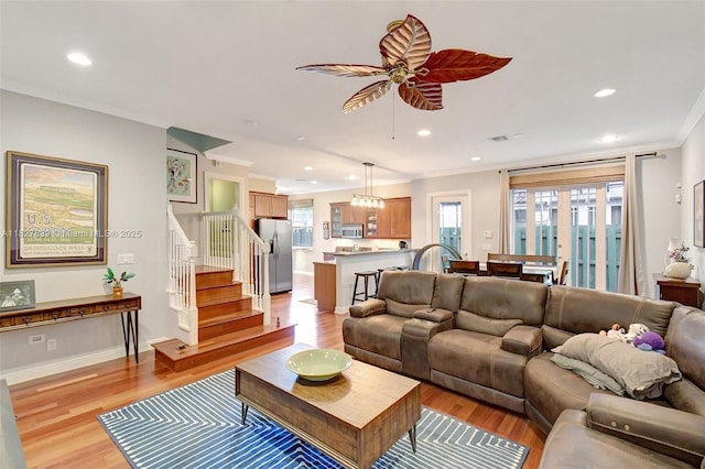 1110 SE 4th Ave, Fort Lauderdale, FL 33316 - living area with light wood-style flooring, crown molding, recessed lighting, stairway, and ceiling fan