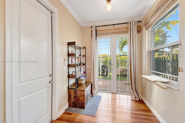 1110 SE 4th Ave, Fort Lauderdale, FL 33316 - doorway to outside with crown molding, light wood-type flooring, and french doors