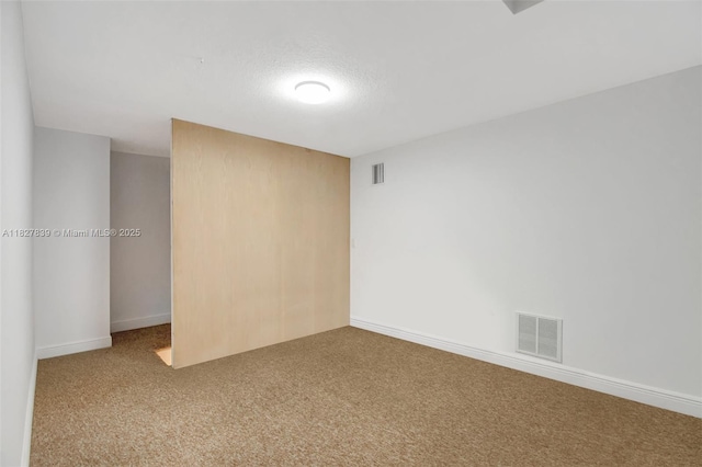 1110 SE 4th Ave, Fort Lauderdale, FL 33316 - carpeted empty room featuring a textured ceiling and baseboards