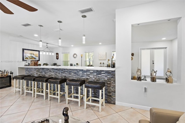 16400 SW 80th Ave, Palmetto Bay, FL 33157 - indoor wet bar featuring a ceiling fan, light tile patterned floors, decorative light fixtures, and recessed lighting