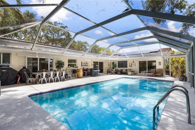 16400 SW 80th Ave, Palmetto Bay, FL 33157 - outdoor pool with a patio area, an outdoor living space, and glass enclosure