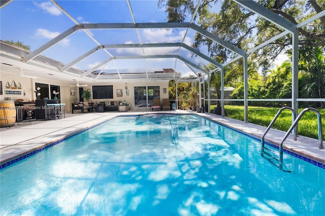 16400 SW 80th Ave, Palmetto Bay, FL 33157 - swimming pool featuring an outdoor hangout area, a patio, and a lanai