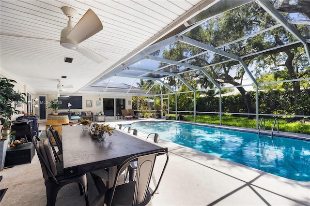 16400 SW 80th Ave, Palmetto Bay, FL 33157 - outdoor pool with a patio, ceiling fan, outdoor dining area, and glass enclosure