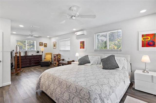 16400 SW 80th Ave, Palmetto Bay, FL 33157 - bedroom with a wall unit AC, wood finished floors, recessed lighting, and a ceiling fan