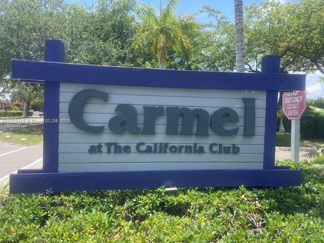 907 NE 199th St Unit 106, Miami, FL 33179 - view of community sign