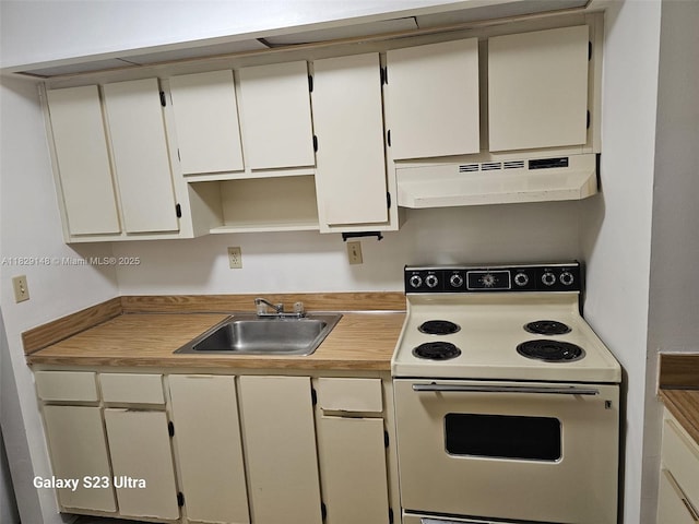 907 NE 199th St Unit 106, Miami, FL 33179 - kitchen with white electric stove, under cabinet range hood, light countertops, and white cabinets