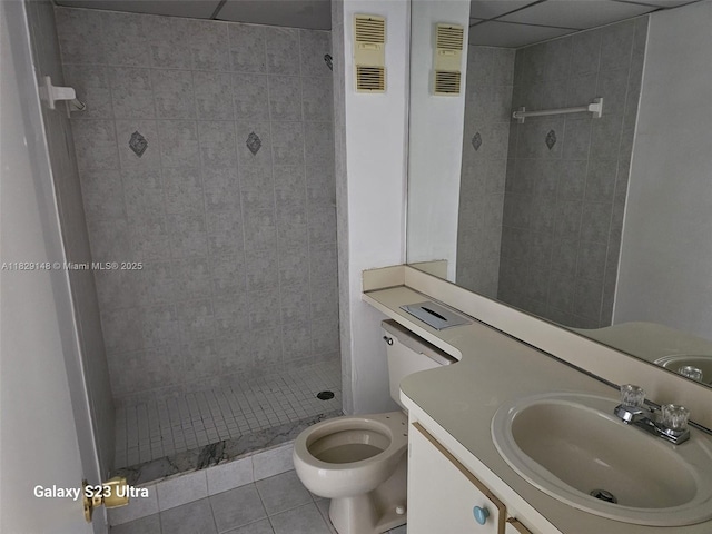 907 NE 199th St Unit 106, Miami, FL 33179 - full bathroom with tiled shower, tile patterned flooring, and vanity