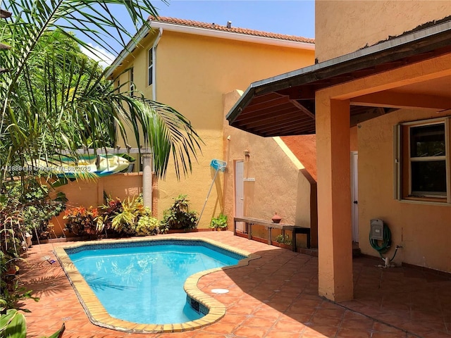 10878 NW 51st Ln, Doral, FL 33178 - outdoor pool with a patio area