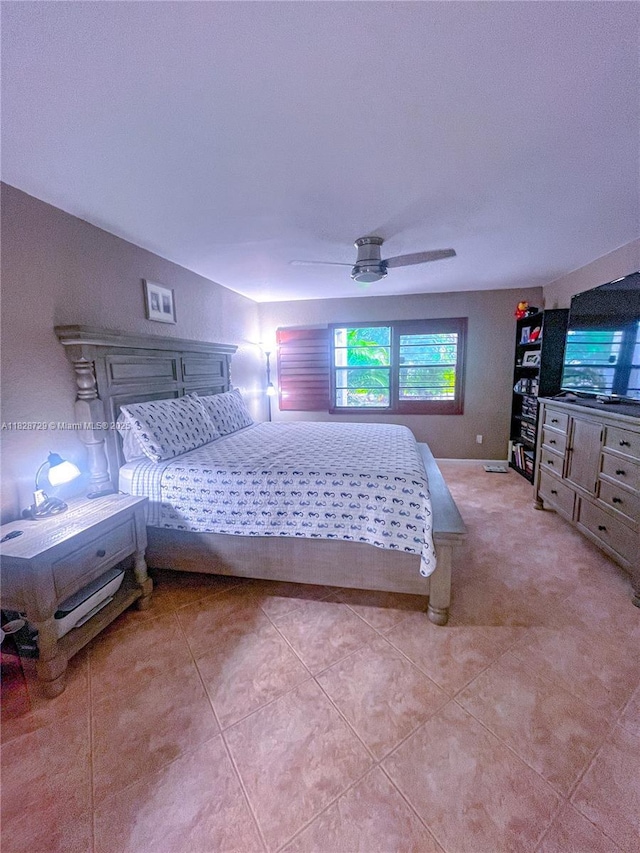 61 W Seminole Ct W, Royal Palm Beach, FL 33411 - bedroom featuring light tile patterned floors and a ceiling fan