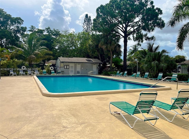 61 W Seminole Ct W, Royal Palm Beach, FL 33411 - community pool featuring a patio area