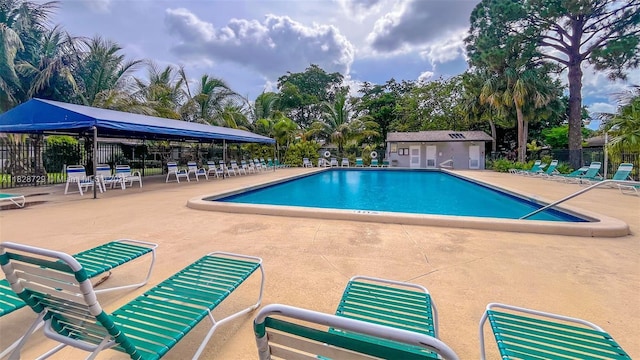 61 W Seminole Ct W, Royal Palm Beach, FL 33411 - community pool featuring a patio