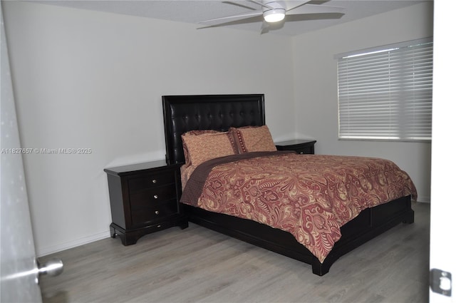 700 SW 128th Ave Unit 106C, Pembroke Pines, FL 33027 - bedroom with light wood finished floors and a ceiling fan