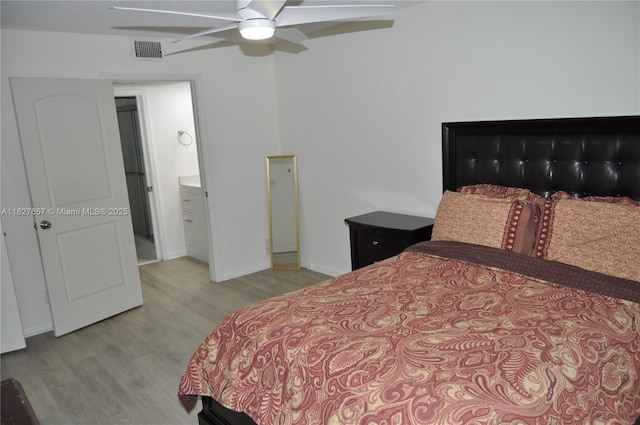 700 SW 128th Ave Unit 106C, Pembroke Pines, FL 33027 - bedroom with wood finished floors and a ceiling fan