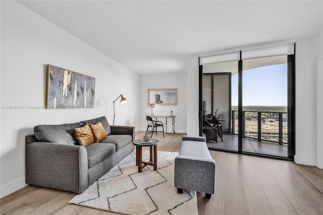 121 NE 34th St Unit 1514, Miami, FL 33137 - living area with floor to ceiling windows and wood finished floors