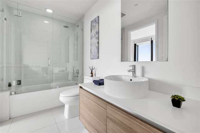 121 NE 34th St Unit 1514, Miami, FL 33137 - bathroom with vanity, bath / shower combo with glass door, and tile patterned floors