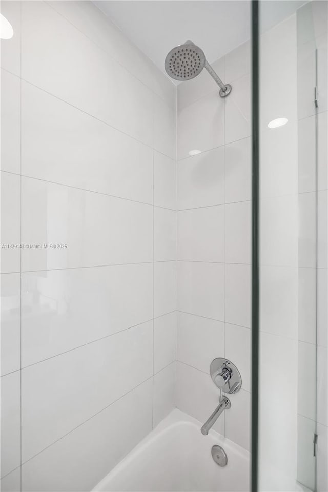 121 NE 34th St Unit 1514, Miami, FL 33137 - bathroom featuring washtub / shower combination