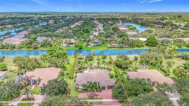 4268 SW 141st Ave, Davie, FL 33330 - aerial view of residential area featuring a nearby body of water and property boundaries highlighted