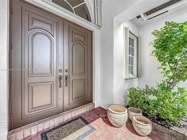 4268 SW 141st Ave, Davie, FL 33330 - view of exterior entry featuring stucco siding