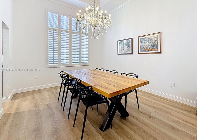 4268 SW 141st Ave, Davie, FL 33330 - dining area featuring ornamental molding, light wood-style floors, a chandelier, and plenty of natural light