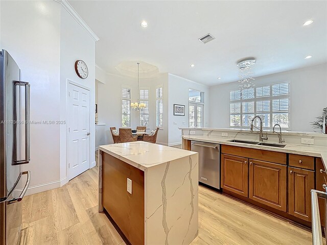 4268 SW 141st Ave, Davie, FL 33330 - kitchen with dishwasher, a chandelier, light wood-style floors, freestanding refrigerator, and recessed lighting