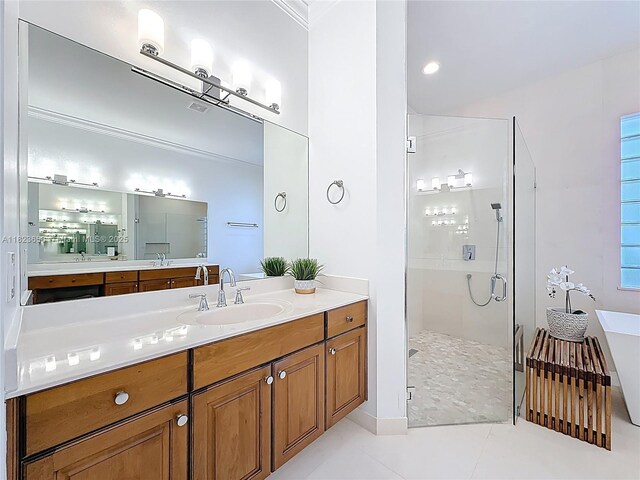 4268 SW 141st Ave, Davie, FL 33330 - full bathroom with a stall shower, a freestanding bath, vanity, and tile patterned flooring