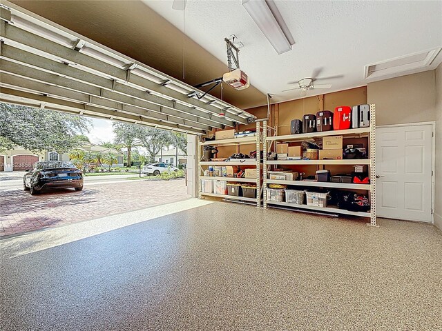 4268 SW 141st Ave, Davie, FL 33330 - garage featuring a ceiling fan and a garage door opener