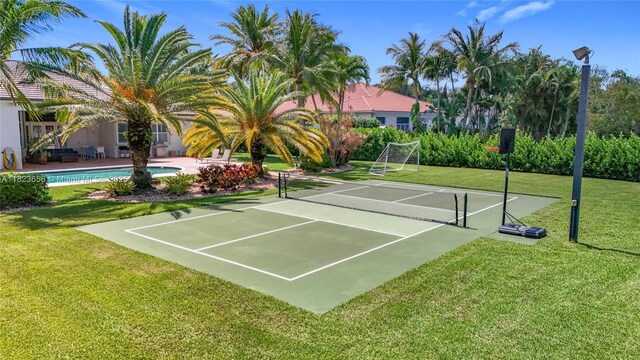 4268 SW 141st Ave, Davie, FL 33330 - view of home's community with a tennis court and a yard