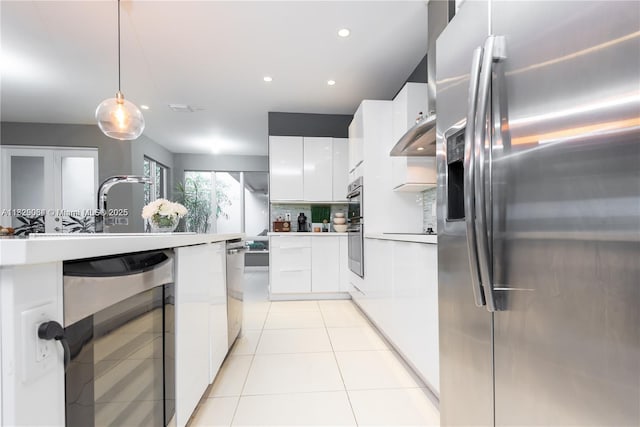 10555 NW 64th Way, Doral, FL 33178 - kitchen featuring appliances with stainless steel finishes, beverage cooler, modern cabinets, white cabinets, and recessed lighting