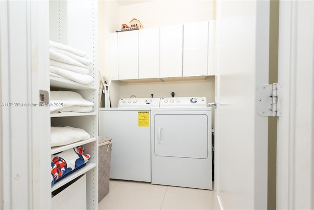 10555 NW 64th Way, Doral, FL 33178 - washroom with independent washer and dryer, cabinet space, and light tile patterned floors