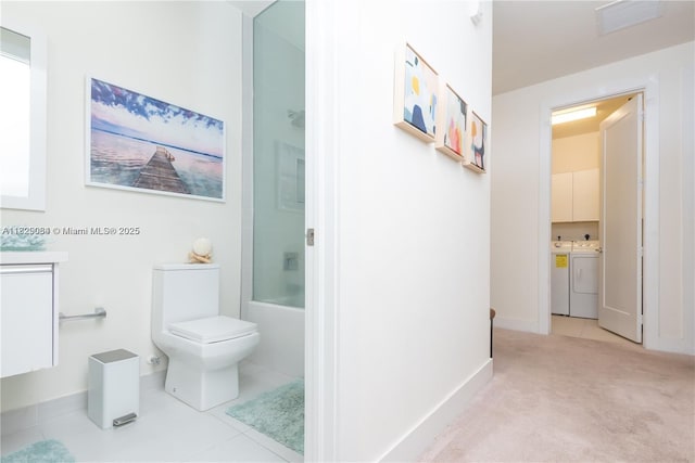 10555 NW 64th Way, Doral, FL 33178 - full bathroom with washing machine and dryer, washtub / shower combination, and vanity