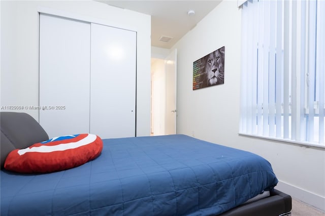 10555 NW 64th Way, Doral, FL 33178 - bedroom with baseboards and a closet