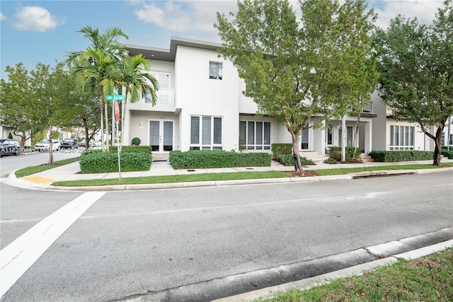 10555 NW 64th Way, Doral, FL 33178 - townhome / multi-family property featuring stucco siding