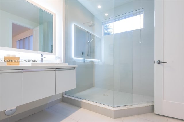 10555 NW 64th Way, Doral, FL 33178 - full bathroom with vanity, a tile shower, tile patterned flooring, and recessed lighting