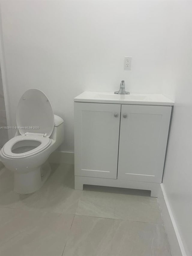 9020 NW 32nd Ave, Miami, FL 33147 - bathroom with tile patterned flooring and vanity