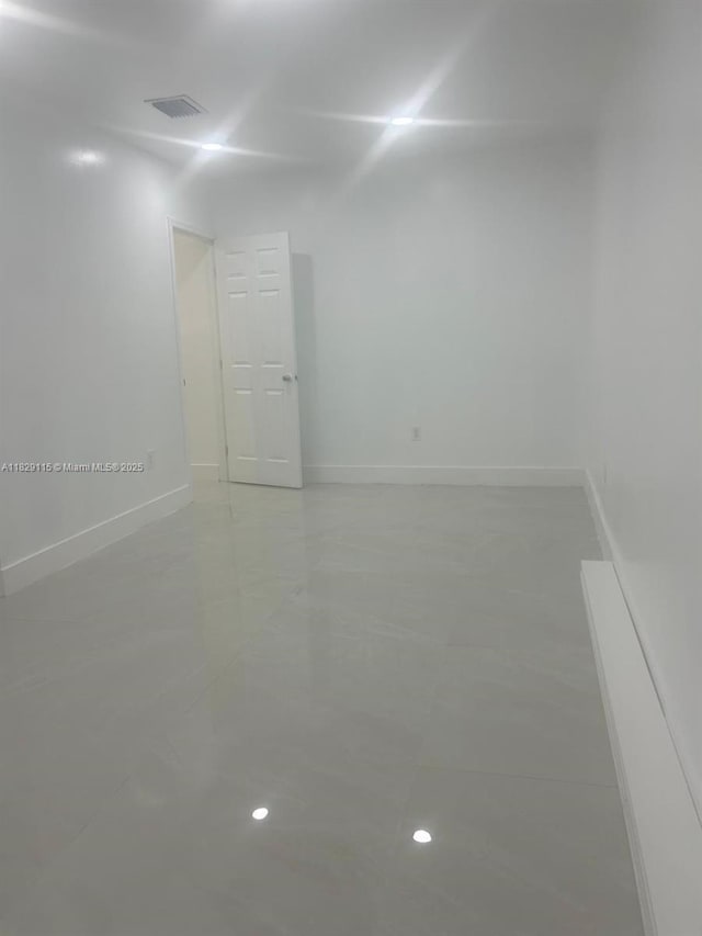 9020 NW 32nd Ave, Miami, FL 33147 - empty room with baseboards