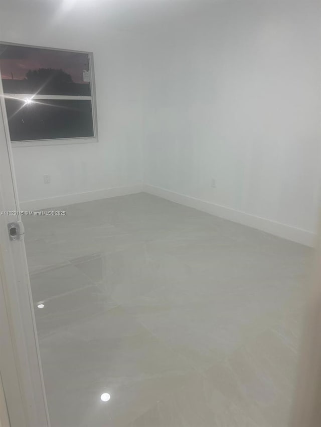 9020 NW 32nd Ave, Miami, FL 33147 - spare room featuring baseboards