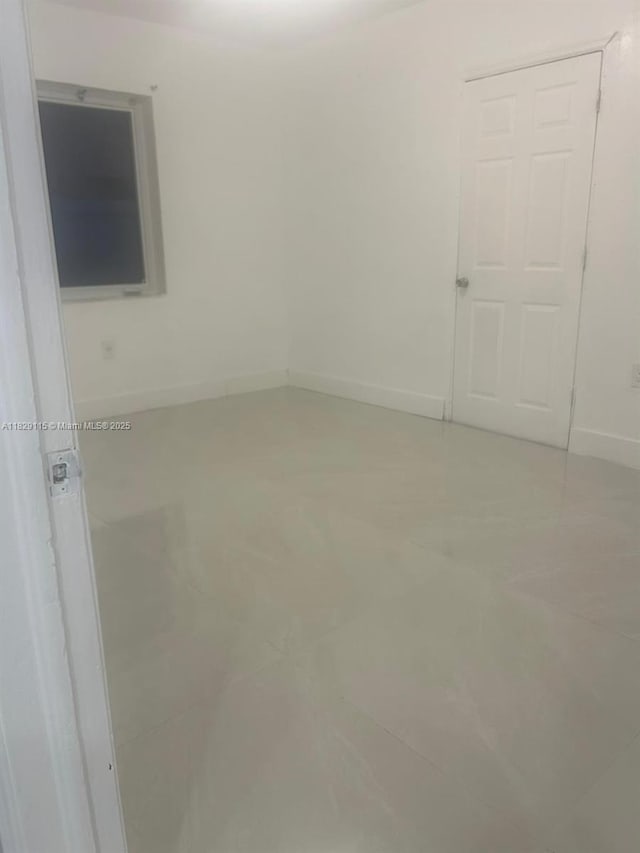 9020 NW 32nd Ave, Miami, FL 33147 - empty room featuring baseboards