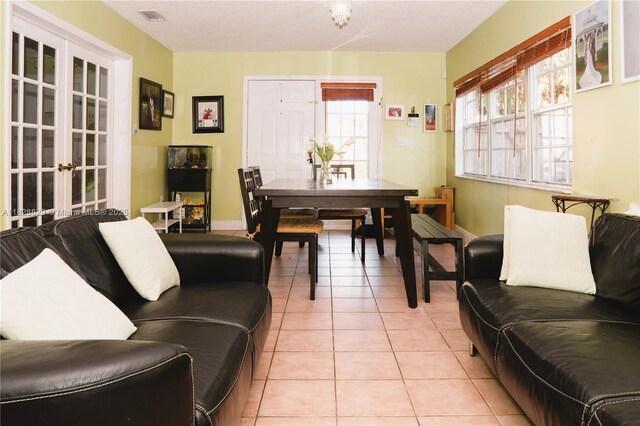 7081 SW 158th Ct, Miami, FL 33193 - living area with light tile patterned floors and baseboards