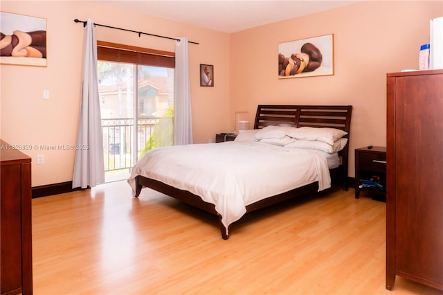 7081 SW 158th Ct, Miami, FL 33193 - bedroom featuring light wood-style floors and access to outside