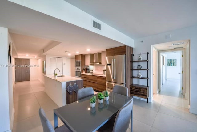 9261 E Bay Harbor Dr Unit 402, Bay Harbor Islands, FL 33154 - dining room featuring light tile patterned floors