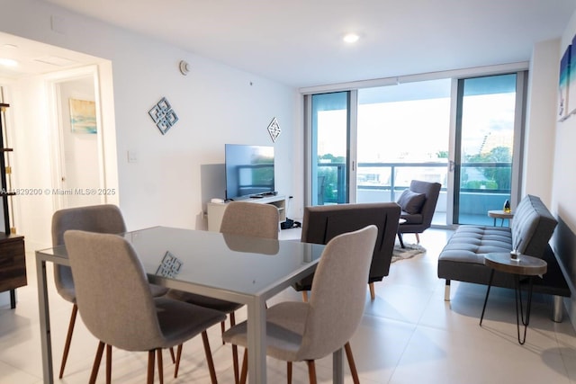 9261 E Bay Harbor Dr Unit 402, Bay Harbor Islands, FL 33154 - dining area with expansive windows, light tile patterned floors, and recessed lighting