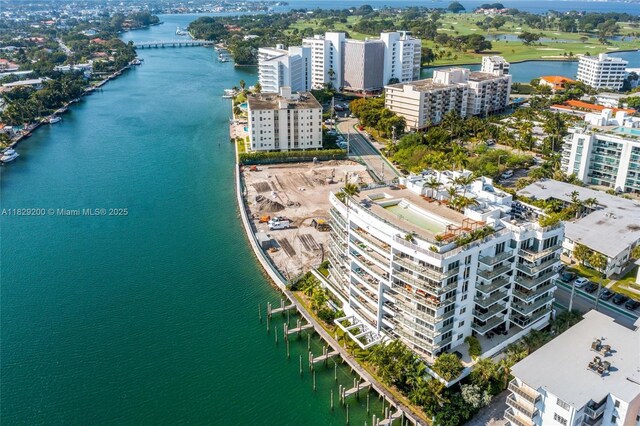 9261 E Bay Harbor Dr Unit 402, Bay Harbor Islands, FL 33154 - aerial view of a large body of water and apartment complex