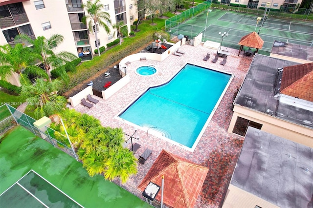 10501 W Broward Blvd Unit 304, Plantation, FL 33324 - community pool featuring a gazebo, a patio area, and a hot tub