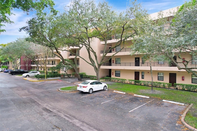 10501 W Broward Blvd Unit 304, Plantation, FL 33324 - view of property with uncovered parking